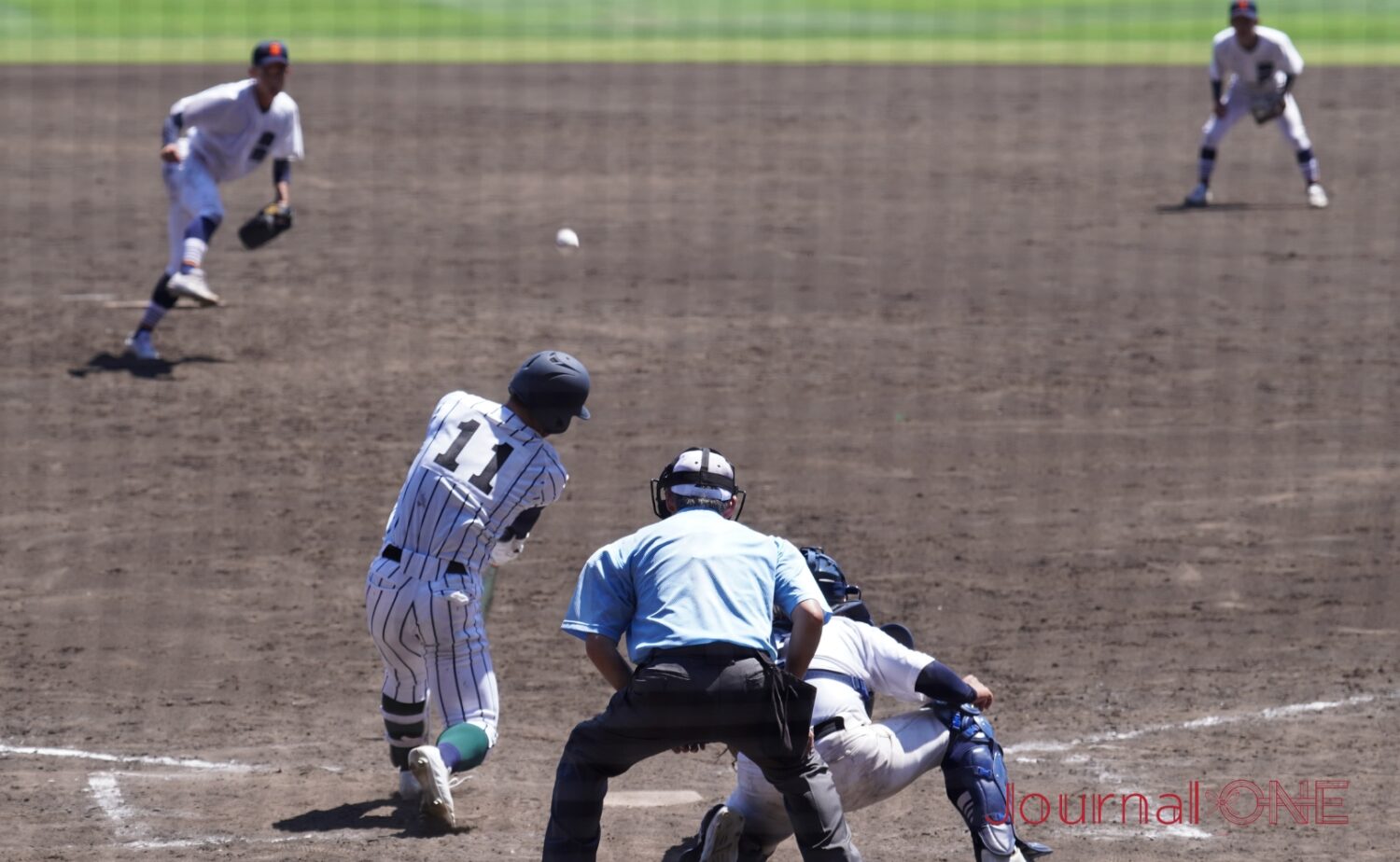 決勝の犠飛を放つ開星・前田-Journal-ONE撮影