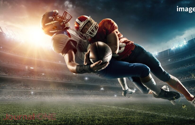 アメリカンフットボールの激しいタックルシーンのイメージ