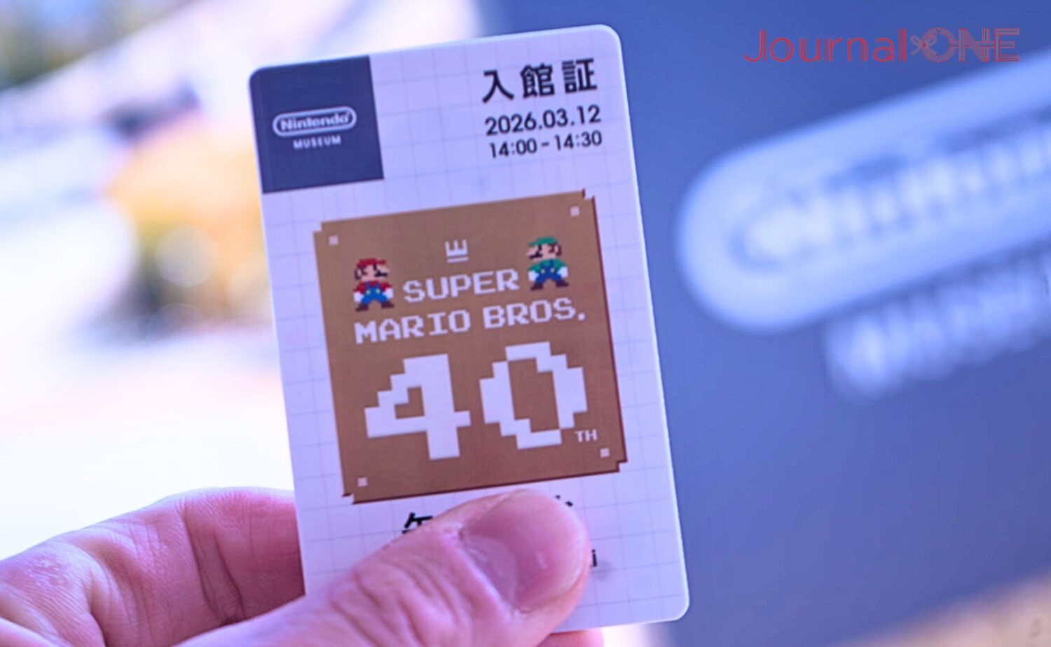 自分の名前が印刷された入館証-Journal-ONE撮影